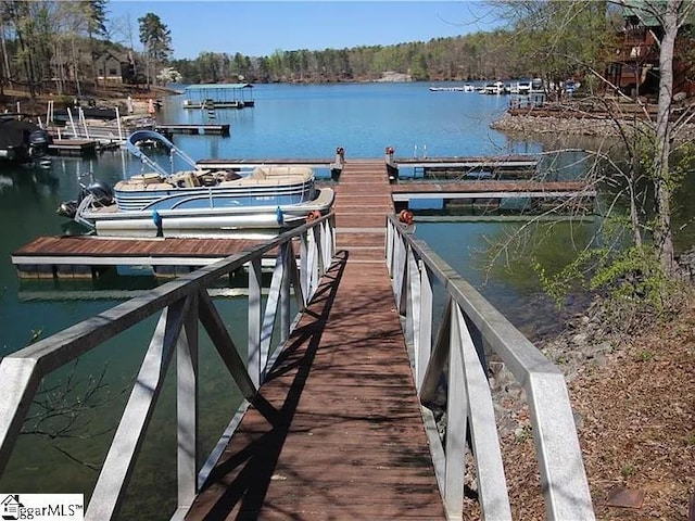 view of dock with a water view