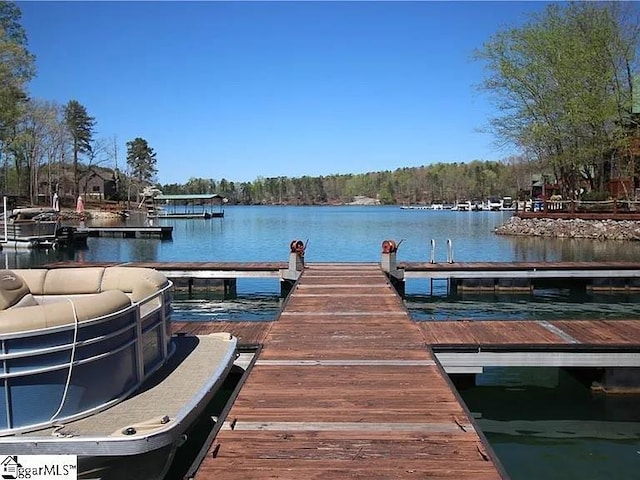 view of dock featuring a water view