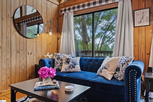 living room with wooden walls