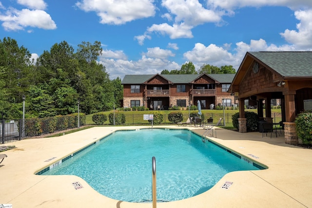 view of pool with a gazebo and a patio area