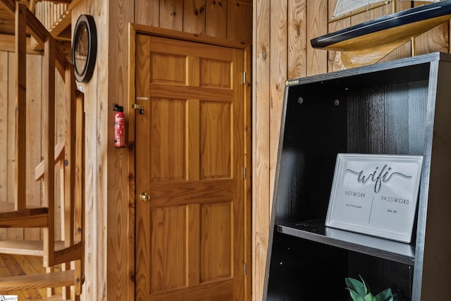 interior details featuring wooden walls