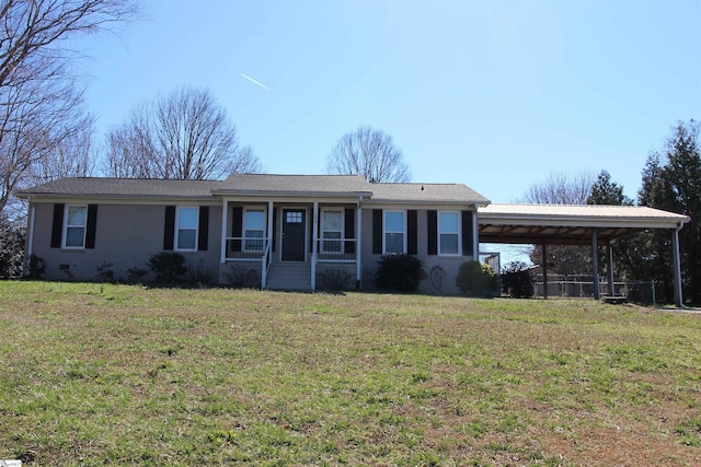 ranch-style house with a carport and a front yard