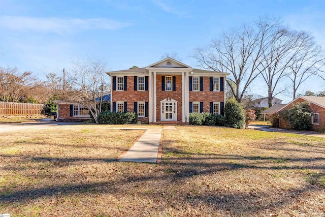 view of front of property with a front lawn