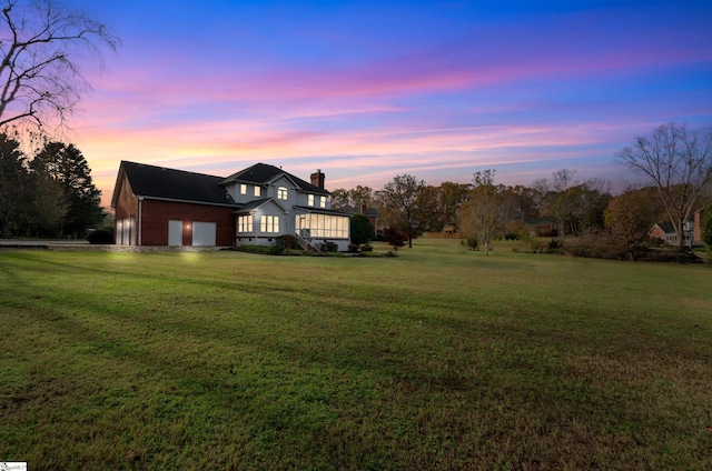 view of front of house featuring a yard