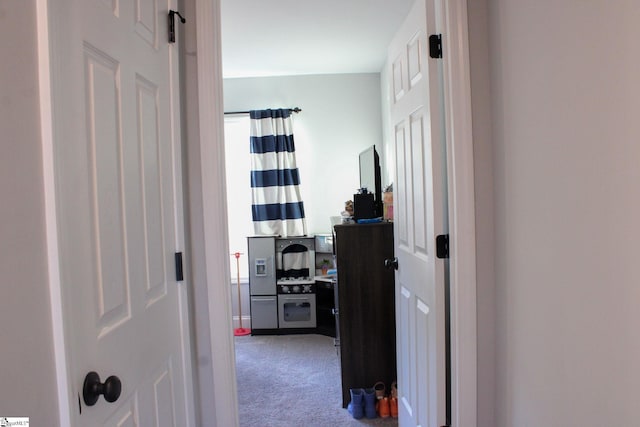 hallway with carpet