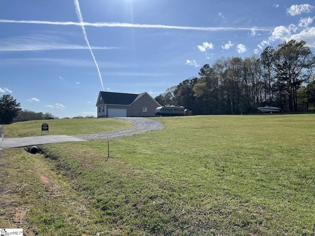626 Johnny Long Rd, Iva, SC 29626 - view of yard featuring gravel driveway and a garage