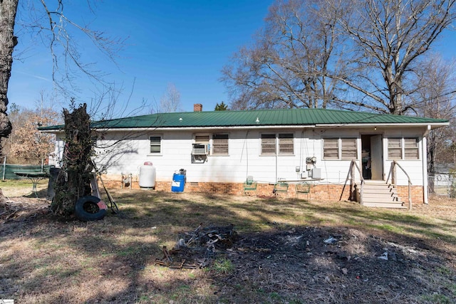 back of property featuring cooling unit