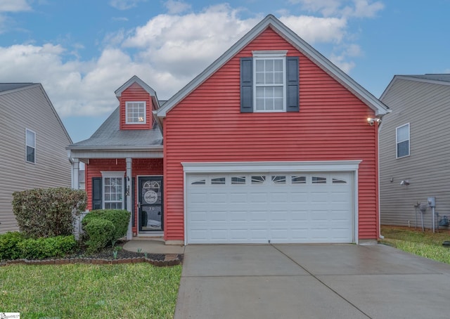 view of front of property with a garage