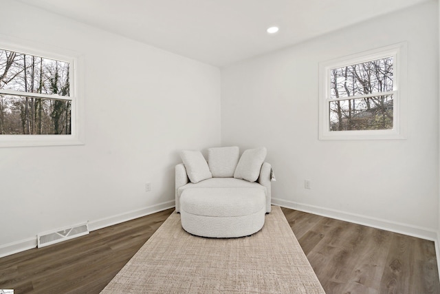 living area with dark wood-type flooring