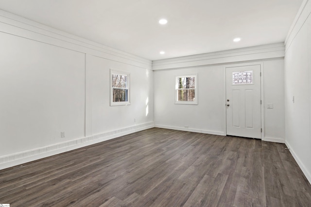 foyer entrance with dark hardwood / wood-style flooring