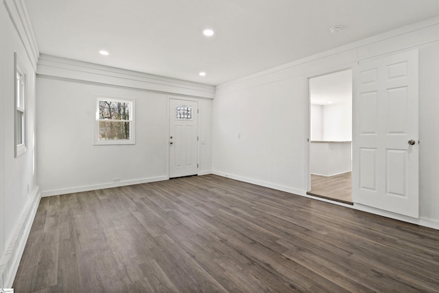 unfurnished room with dark wood-type flooring