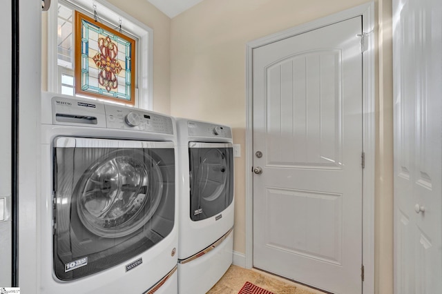 laundry area featuring independent washer and dryer