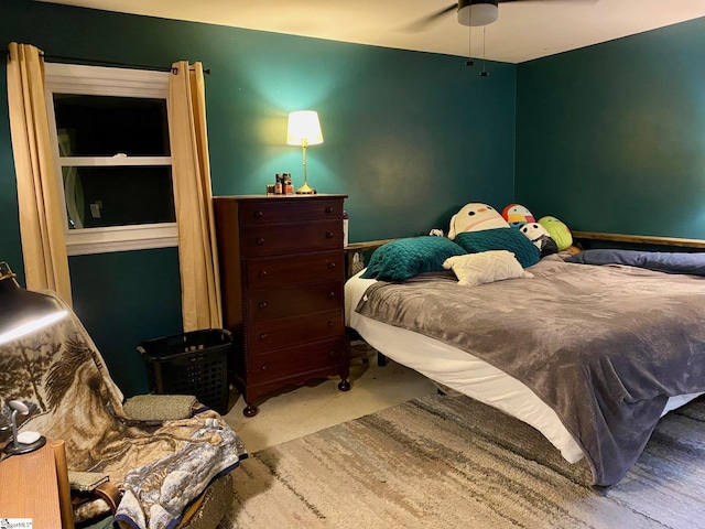 carpeted bedroom featuring ceiling fan