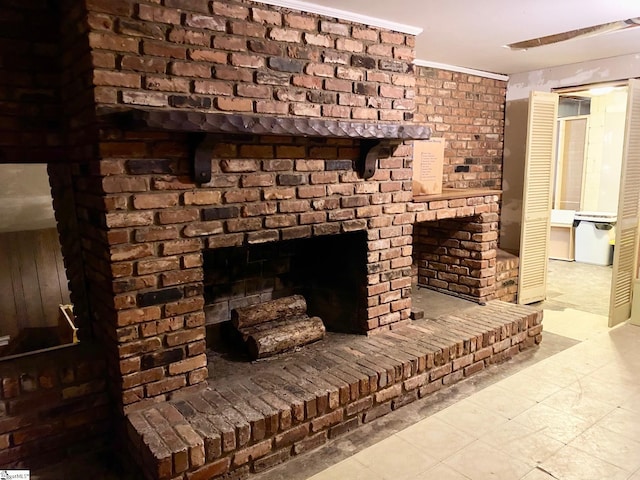 interior details featuring a brick fireplace