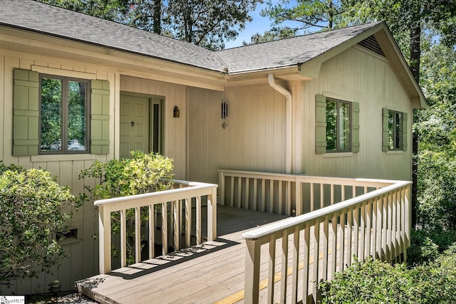 entrance to property with a wooden deck