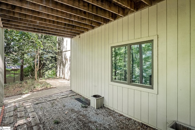 view of side of property featuring a patio