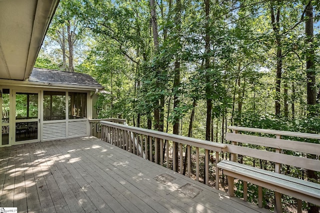 deck with a sunroom