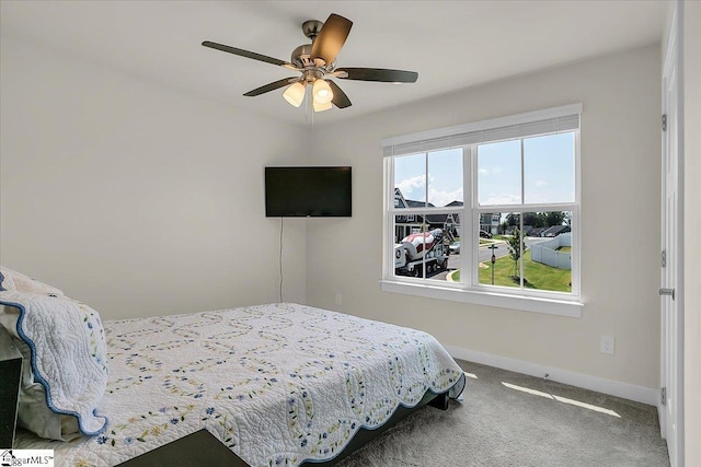 bedroom featuring carpet and ceiling fan