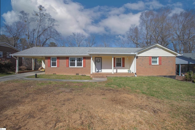 single story home featuring a carport, a porch, and a front yard