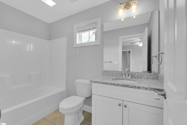 full bathroom with vanity,  shower combination, toilet, and tile patterned floors