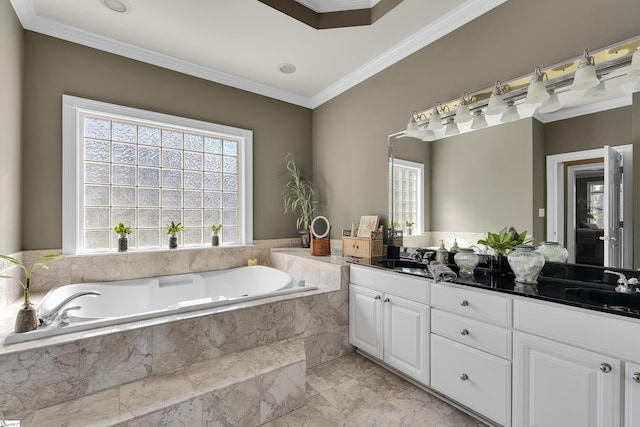 bathroom featuring ornamental molding, vanity, and tiled tub