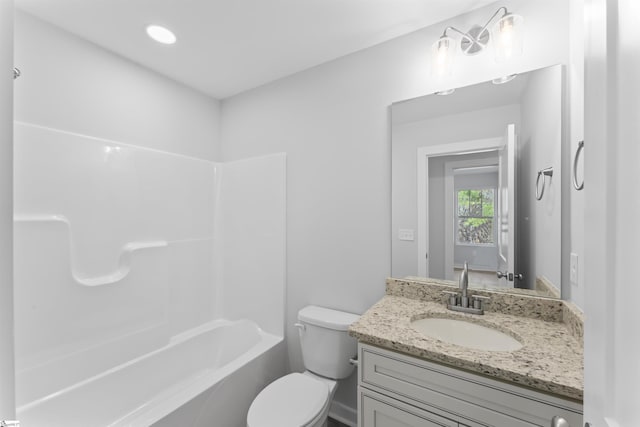 full bathroom with vanity, toilet, and bathtub / shower combination