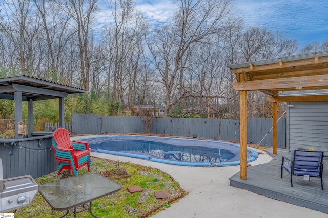 view of pool with a deck