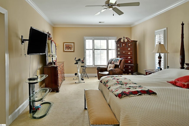 bedroom with ceiling fan, crown molding, and light carpet