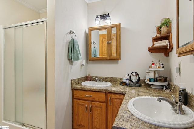 bathroom featuring vanity, crown molding, and a shower with door