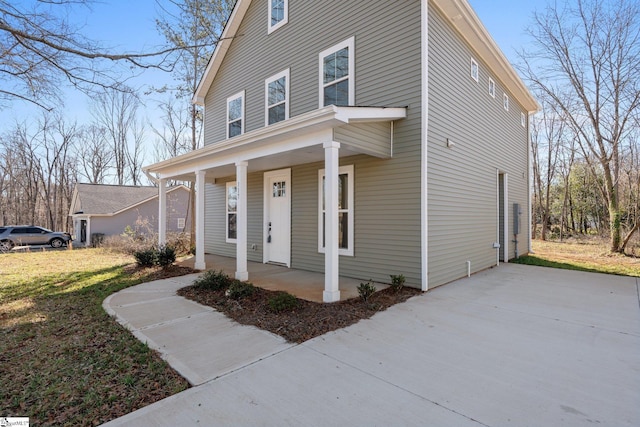 front of property featuring covered porch