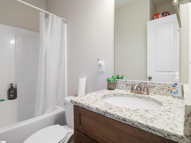 full bathroom with shower / tub combo, toilet, and vanity