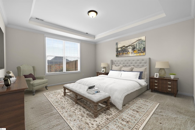 carpeted bedroom featuring crown molding and a raised ceiling