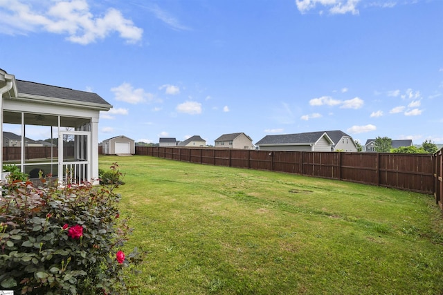 view of yard featuring a sunroom