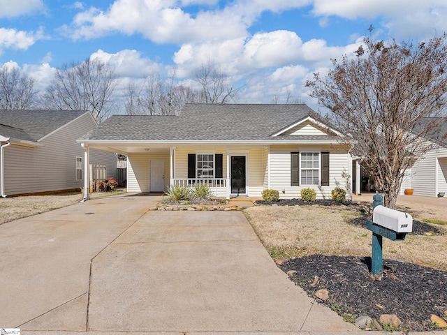 ranch-style home with a carport and a porch