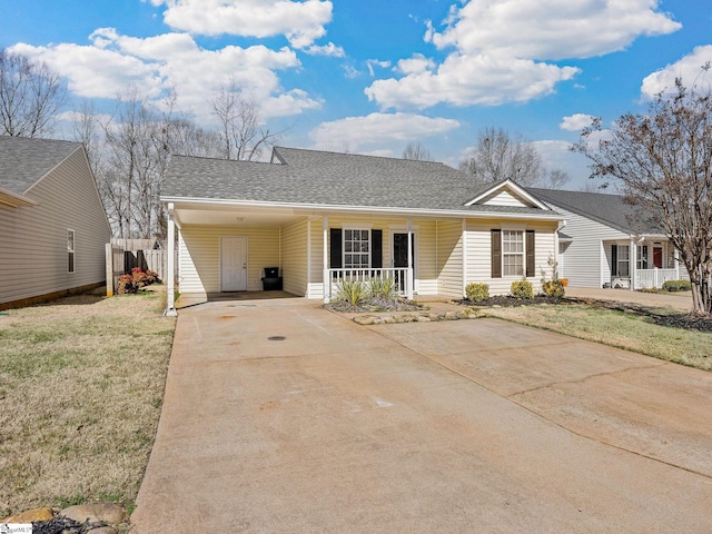 ranch-style home with a front lawn, a carport, and a porch