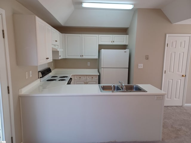 kitchen featuring white cabinets, vaulted ceiling, white fridge, sink, and electric range oven