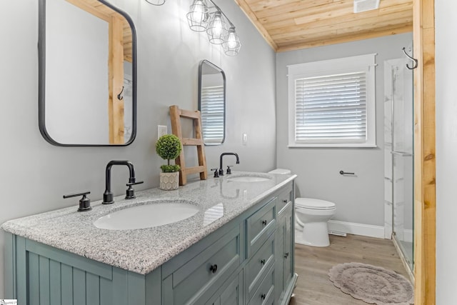 bathroom with hardwood / wood-style flooring, a shower, toilet, wooden ceiling, and vanity