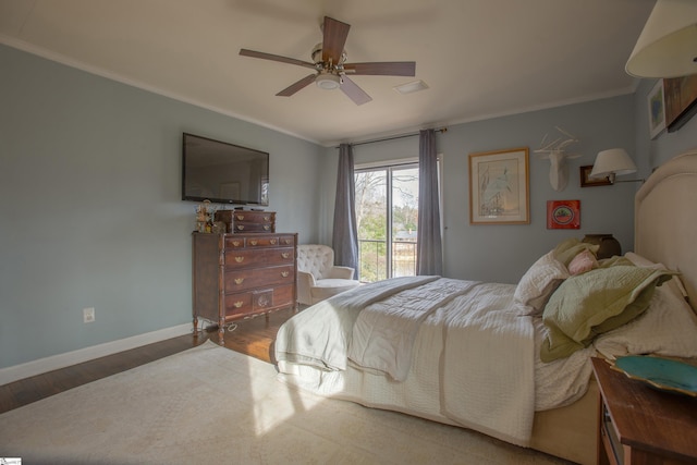 bedroom with access to exterior, ornamental molding, hardwood / wood-style flooring, and ceiling fan