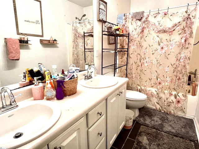 full bathroom featuring shower / tub combo with curtain, vanity, toilet, and tile patterned floors