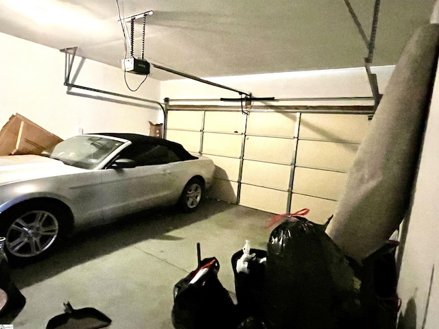 garage featuring a garage door opener