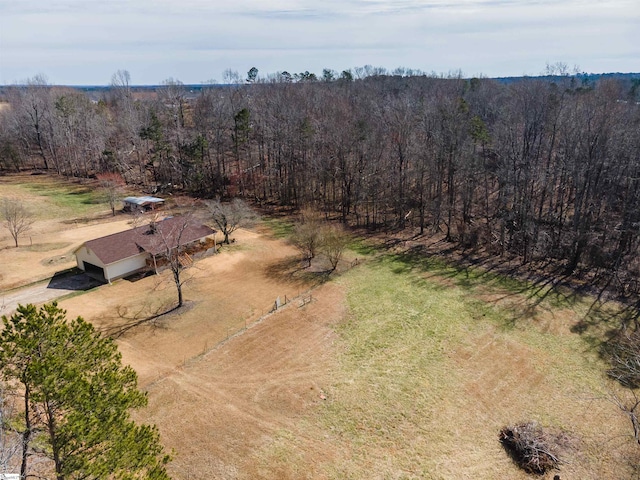 birds eye view of property featuring a rural view