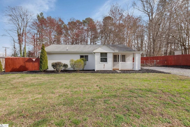 view of front of home with a porch and a front lawn