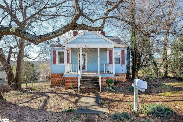 bungalow-style house featuring covered porch