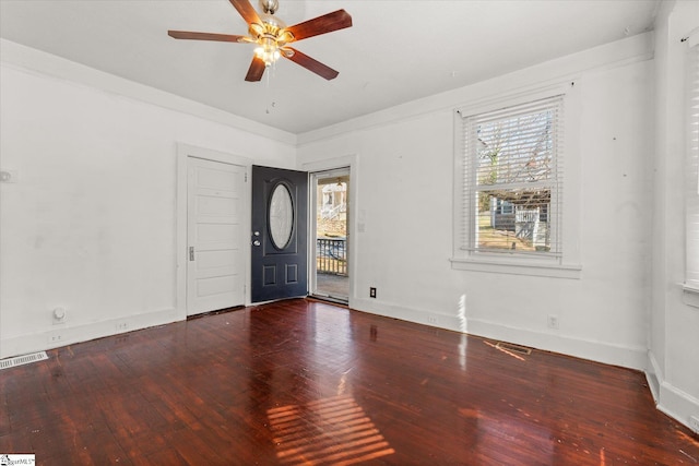 entryway with ceiling fan and wood-type flooring