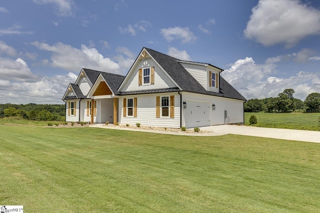 view of front facade with a front lawn and a garage