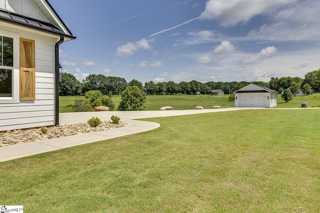 view of yard featuring a garage