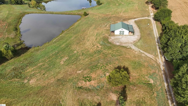 bird's eye view featuring a rural view and a water view