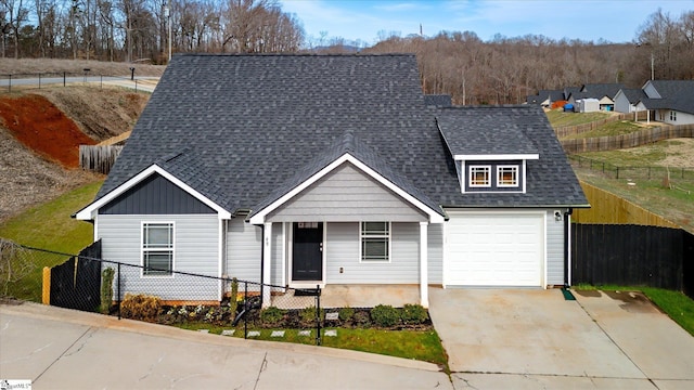 view of front of property featuring a garage