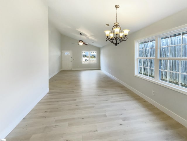 10 Maplecroft St, Greenville, SC 29609 - unfurnished dining area with visible vents, baseboards, lofted ceiling, light wood-style flooring, and ceiling fan with notable chandelier