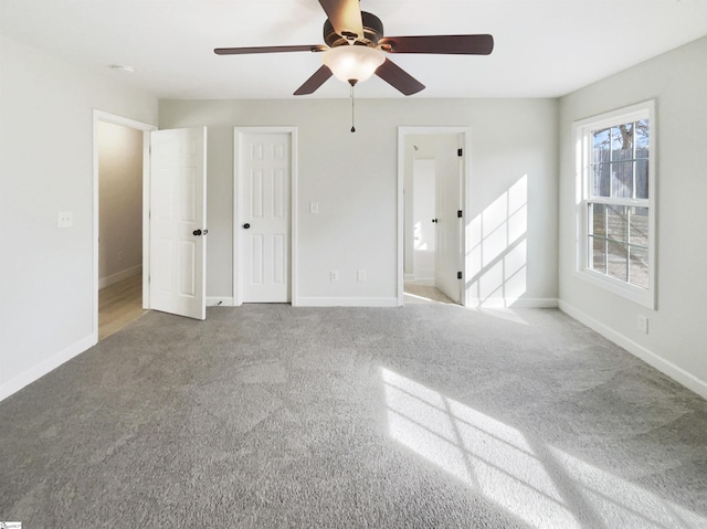 10 Maplecroft St, Greenville, SC 29609 - unfurnished bedroom featuring light colored carpet, ceiling fan, baseboards, and ensuite bathroom